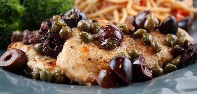 Pork Chops in White Wine Sauce With Capers & Black Olives